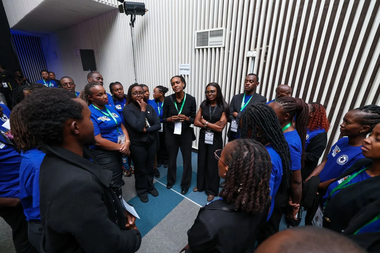 Waridi Events crew lead briefing the event team before doors open